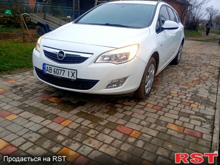 Белый Опель Астра, объемом двигателя 1.2 л и пробегом 260 тыс. км за 5700 $, фото 1 на Automoto.ua