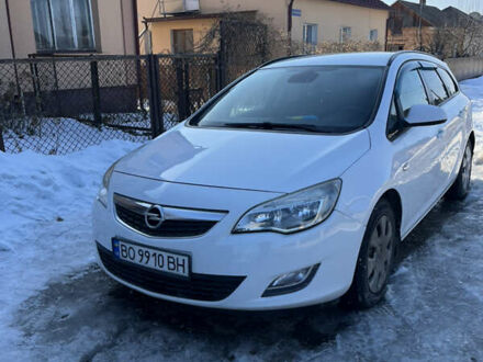 Белый Опель Астра, объемом двигателя 1.25 л и пробегом 255 тыс. км за 5800 $, фото 1 на Automoto.ua