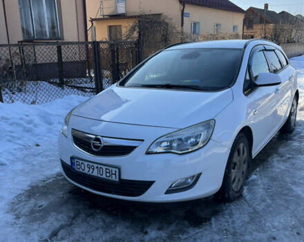 Белый Опель Астра, объемом двигателя 1.25 л и пробегом 255 тыс. км за 5800 $, фото 1 на Automoto.ua
