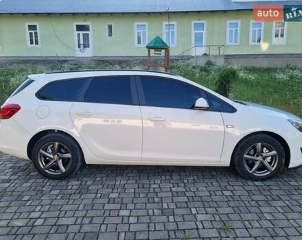 Белый Опель Астра, объемом двигателя 1.25 л и пробегом 195 тыс. км за 6600 $, фото 1 на Automoto.ua