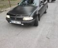 Черный Опель Астра, объемом двигателя 1.6 л и пробегом 300 тыс. км за 1550 $, фото 1 на Automoto.ua