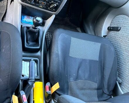 Черный Опель Астра, объемом двигателя 1.4 л и пробегом 379 тыс. км за 1200 $, фото 12 на Automoto.ua