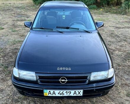 Черный Опель Астра, объемом двигателя 1.4 л и пробегом 379 тыс. км за 1200 $, фото 2 на Automoto.ua