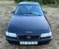 Черный Опель Астра, объемом двигателя 1.4 л и пробегом 379 тыс. км за 1200 $, фото 2 на Automoto.ua