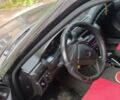Черный Опель Астра, объемом двигателя 1.4 л и пробегом 256 тыс. км за 1450 $, фото 10 на Automoto.ua
