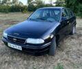 Черный Опель Астра, объемом двигателя 1.4 л и пробегом 379 тыс. км за 1200 $, фото 1 на Automoto.ua