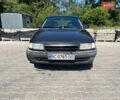 Черный Опель Астра, объемом двигателя 1.6 л и пробегом 373 тыс. км за 1600 $, фото 1 на Automoto.ua