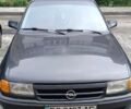 Черный Опель Астра, объемом двигателя 1.4 л и пробегом 256 тыс. км за 1450 $, фото 1 на Automoto.ua