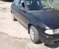 Черный Опель Астра, объемом двигателя 1.4 л и пробегом 200 тыс. км за 1000 $, фото 5 на Automoto.ua