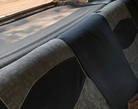 Черный Опель Астра, объемом двигателя 1.4 л и пробегом 280 тыс. км за 1100 $, фото 3 на Automoto.ua