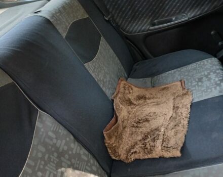 Черный Опель Астра, объемом двигателя 1.4 л и пробегом 280 тыс. км за 1100 $, фото 4 на Automoto.ua