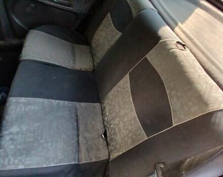 Черный Опель Астра, объемом двигателя 1.4 л и пробегом 270 тыс. км за 1400 $, фото 4 на Automoto.ua