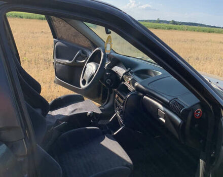 Черный Опель Астра, объемом двигателя 1.6 л и пробегом 340 тыс. км за 2300 $, фото 3 на Automoto.ua