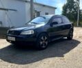 Черный Опель Астра, объемом двигателя 1.6 л и пробегом 264 тыс. км за 1300 $, фото 3 на Automoto.ua
