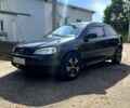 Черный Опель Астра, объемом двигателя 1.6 л и пробегом 264 тыс. км за 1300 $, фото 1 на Automoto.ua