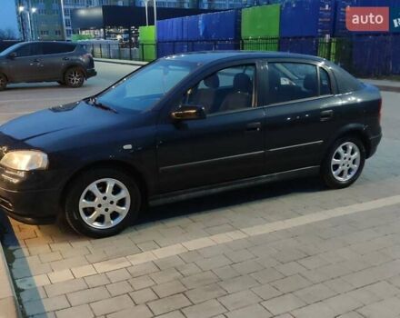 Черный Опель Астра, объемом двигателя 1.6 л и пробегом 246 тыс. км за 3700 $, фото 5 на Automoto.ua