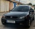 Черный Опель Астра, объемом двигателя 1.6 л и пробегом 385 тыс. км за 3900 $, фото 1 на Automoto.ua