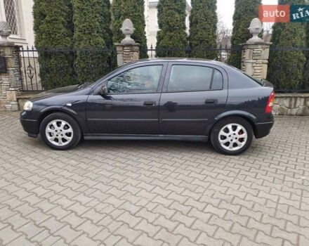 Черный Опель Астра, объемом двигателя 1.6 л и пробегом 246 тыс. км за 3700 $, фото 1 на Automoto.ua