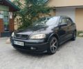 Чорний Опель Астра, об'ємом двигуна 1.4 л та пробігом 300 тис. км за 1430 $, фото 1 на Automoto.ua