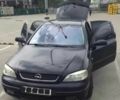 Черный Опель Астра, объемом двигателя 1.6 л и пробегом 173 тыс. км за 3300 $, фото 1 на Automoto.ua