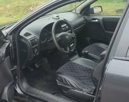 Черный Опель Астра, объемом двигателя 1.6 л и пробегом 171 тыс. км за 2199 $, фото 12 на Automoto.ua