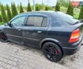 Черный Опель Астра, объемом двигателя 2 л и пробегом 300 тыс. км за 2200 $, фото 1 на Automoto.ua