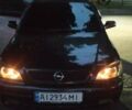 Черный Опель Астра, объемом двигателя 1.6 л и пробегом 385 тыс. км за 3900 $, фото 7 на Automoto.ua