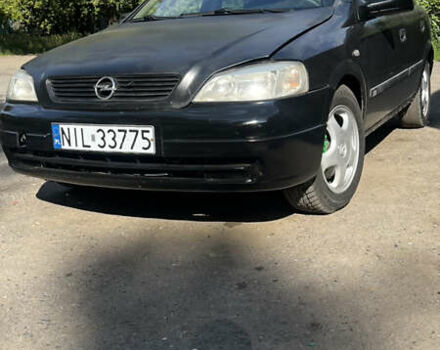 Черный Опель Астра, объемом двигателя 1.9 л и пробегом 300 тыс. км за 2053 $, фото 5 на Automoto.ua
