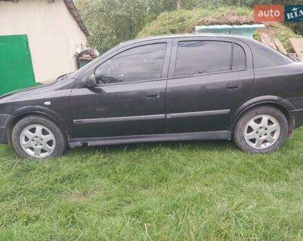 Черный Опель Астра, объемом двигателя 1.8 л и пробегом 249 тыс. км за 2200 $, фото 6 на Automoto.ua