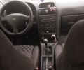 Черный Опель Астра, объемом двигателя 1.8 л и пробегом 249 тыс. км за 2200 $, фото 1 на Automoto.ua