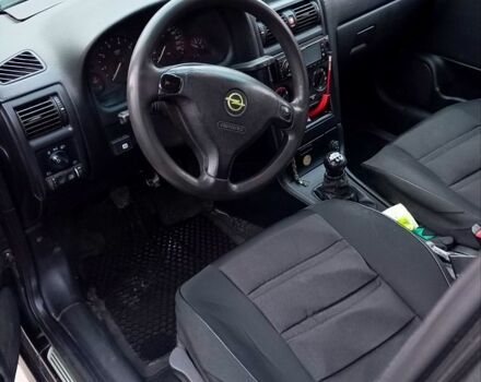 Черный Опель Астра, объемом двигателя 1.6 л и пробегом 380 тыс. км за 2800 $, фото 4 на Automoto.ua