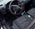 Черный Опель Астра, объемом двигателя 1.6 л и пробегом 380 тыс. км за 2800 $, фото 4 на Automoto.ua