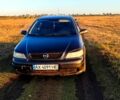 Черный Опель Астра, объемом двигателя 1.6 л и пробегом 330 тыс. км за 2000 $, фото 4 на Automoto.ua