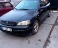 Черный Опель Астра, объемом двигателя 1.6 л и пробегом 380 тыс. км за 2800 $, фото 1 на Automoto.ua