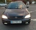 Черный Опель Астра, объемом двигателя 1.6 л и пробегом 220 тыс. км за 4000 $, фото 8 на Automoto.ua