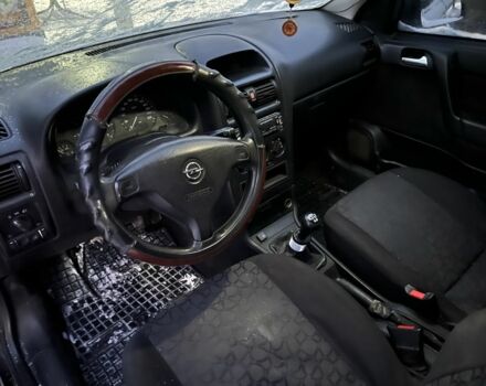 Черный Опель Астра, объемом двигателя 1.6 л и пробегом 250 тыс. км за 1900 $, фото 4 на Automoto.ua