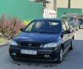 Черный Опель Астра, объемом двигателя 1.6 л и пробегом 220 тыс. км за 3648 $, фото 2 на Automoto.ua
