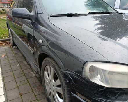 Черный Опель Астра, объемом двигателя 2 л и пробегом 311 тыс. км за 1650 $, фото 1 на Automoto.ua