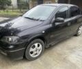 Черный Опель Астра, объемом двигателя 1.8 л и пробегом 230 тыс. км за 2400 $, фото 1 на Automoto.ua