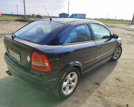 Черный Опель Астра, объемом двигателя 2 л и пробегом 299 тыс. км за 2141 $, фото 3 на Automoto.ua