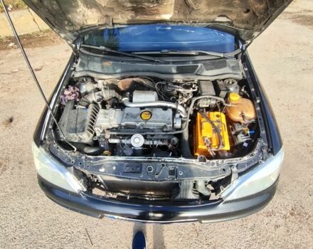 Черный Опель Астра, объемом двигателя 2 л и пробегом 299 тыс. км за 2141 $, фото 7 на Automoto.ua