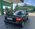 Черный Опель Астра, объемом двигателя 1.6 л и пробегом 220 тыс. км за 3648 $, фото 5 на Automoto.ua