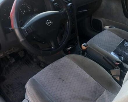 Черный Опель Астра, объемом двигателя 2 л и пробегом 300 тыс. км за 841 $, фото 3 на Automoto.ua