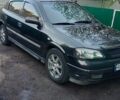Черный Опель Астра, объемом двигателя 2 л и пробегом 300 тыс. км за 2300 $, фото 1 на Automoto.ua