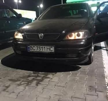 Черный Опель Астра, объемом двигателя 1.8 л и пробегом 230 тыс. км за 2400 $, фото 2 на Automoto.ua