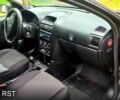 Черный Опель Астра, объемом двигателя 1.6 л и пробегом 345 тыс. км за 3100 $, фото 8 на Automoto.ua