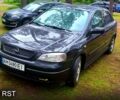 Черный Опель Астра, объемом двигателя 1.6 л и пробегом 345 тыс. км за 3100 $, фото 1 на Automoto.ua