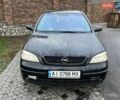 Черный Опель Астра, объемом двигателя 1.6 л и пробегом 330 тыс. км за 3200 $, фото 1 на Automoto.ua