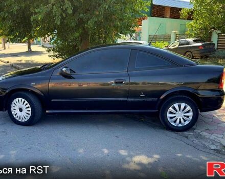 Черный Опель Астра, объемом двигателя 2.2 л и пробегом 200 тыс. км за 2500 $, фото 2 на Automoto.ua