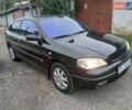 Черный Опель Астра, объемом двигателя 1.6 л и пробегом 240 тыс. км за 3589 $, фото 2 на Automoto.ua
